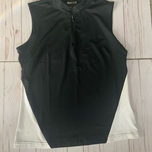 Women’s black and white size large golf top